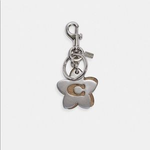 NWT Coach wildflower key ring silver/khaki. Dog leash clip. Great gift!